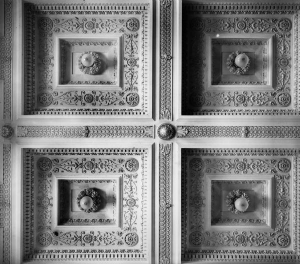 Close-up of the coffered ceiling detail in the Wisconsin Historical Society Library Reading Room, also showing the pendant light fixtures.