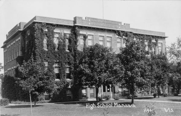 Manawa High School.  It is postmarked 1930, the year in which Joseph R. McCarthy, certainly its most famous graduate, completed his high school curriculum.  McCarthy had dropped out of school at age 14, but returned six years later while managing a grocery store in Manawa.  He was able to complete the four-year course in one year.