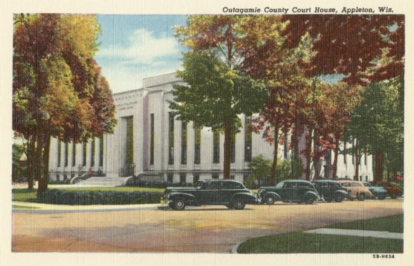 Linen-type postcard depicting Outagamie County Court House. This view was issued by the Curt Teich company in 1945, the year in which Joseph R. McCarthy, certainly the most famous judge to preside over the circuit court in that building, returned to the bench from his service in the Marines. Caption reads: "Outagamie County Court House, Appleton, Wis."