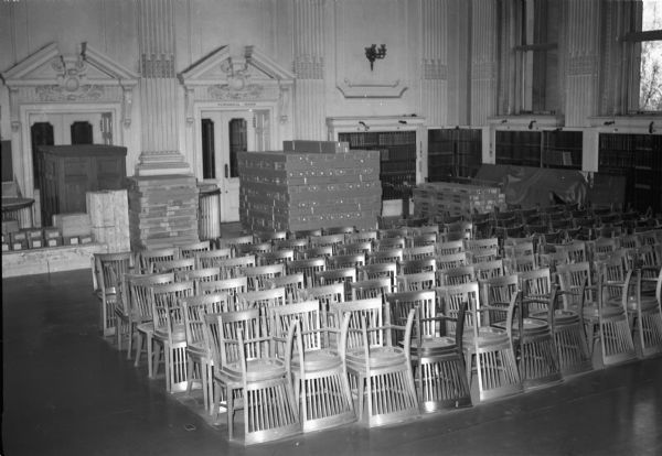 Historical Society Library Reading Room during the modernization of the 1950s, with materials and furniture stored at one end of the room.
