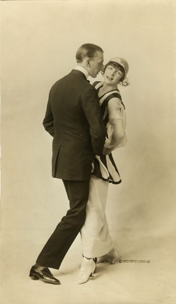 "The Tango of Today." Vernon and Irene Castle demonstrate a modern hands-free tango. A similar photograph was used in their 1914 book <i>Modern Dancing</i>.