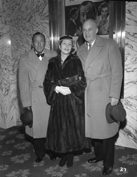 Noel Coward with Alfred Lunt and Lynn Fontanne at the premiere of "The Astonished Heart" in London.