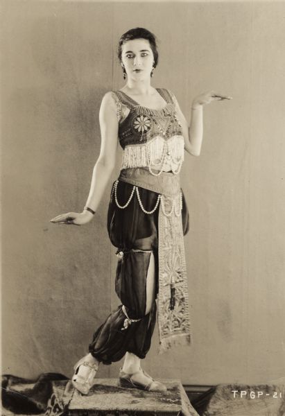 Original caption:
"Nita Naldi, the original Aphrodite girl, who will appear in a Johnny Dooley comedy at the Pantages next week."

Naldi appeared in <i>Aphrodite</i> at the Century Theatre the winter of 1919/1920.