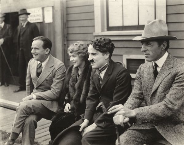 Four of the founders of United Artists, Douglas Fairbanks, Mary Pickford, Charlie Chaplin, and D.W. Griffith.