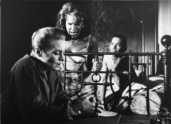 Ingrid Thulin as Ester, Gunnel Lindblom as Anna, and Birger Malmsten who plays a bartender in Ingmar Bergman's <i>Tystnaden (The Silence,</i> 1963).