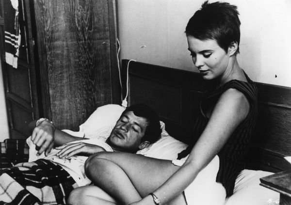Scene still of Jean-Paul Belmondo, as Michel Poiccard, and Jean Seberg, as Patricia Franchini, in Jean-Luc Godard's <i>À bout de souffle (Breathless,</i> 1960).