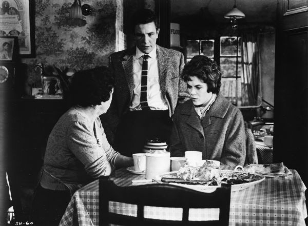 Scene still with Hylda Baker as Aunt Ada, Albert Finney playing Arthur Seaton, and Rachel Roberts as Brenda in Karel Reisz's <i>Saturday Night and Sunday Morning</i> (1960).
