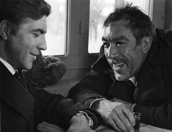 Basil and Alexis Zorbas (played by Alan Bates and Anthony Quinn) have a talk in Mihalis Kakogiannis's <i>Zorba the Greek</i> (1964).