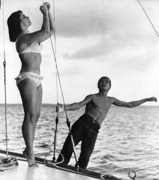 Jolanta Umecka as Krystyna and Zygmunt Malanowicz as the young hitchhiker in Roman Polanski's <i>Nóz w wodzie (Knife in the Water,</i> 1962).