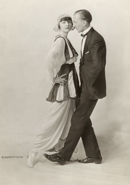 "The Tango of Today." Vernon and Irene Castle demonstrate a modern hands-free tango. A reproduction of this photograph was used in their 1914 book <i>Modern Dancing</i>.