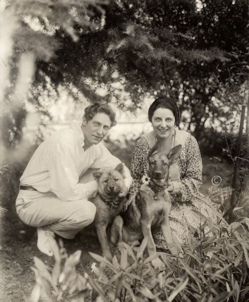 Lou Tellegen, Dutch-born actor, and Geraldine Farrar, American operatic soprano and silent film actress, and two canine friends. Tellegen and Farrar were married from 1916 to 1920.