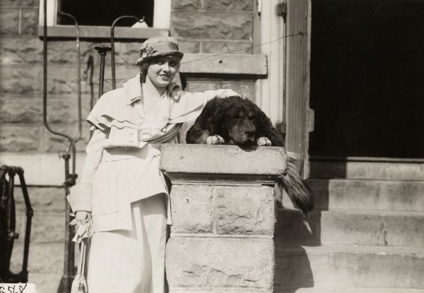 Original caption:
"Corinne Griffith, Vitagraph star, and her new dog 'Shep.'"