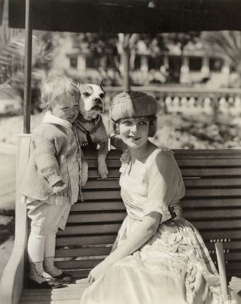 Original caption:
"It's Blanche Sweet's own dog, but a neighbor's child."