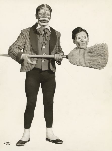 A trick photograph of vaudeville clowns Forunello and Cirillino in which Fortunello holds Cirillino's decapitated head on a broom. Fortunello was the Italian gymnast Alberto Braglia (1883-1954) who won gold medals in Olympic competition in Athens in 1904, London in 1908, and Stockholm in 1912. He became a circus performer in 1918, toured widely, and returned to Italy in 1926.