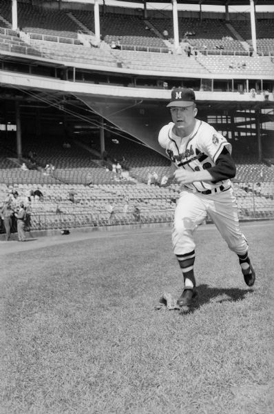 Milwaukee Braves outfielder John DeMerit works out at Milwaukee County Stadium in 1957.  A rookie in 1957, DeMerit made one  appearance in that year's World Series. In the 8th inning of Game 3, DeMerit pinch ran for the slow-footed catcher Del Rice.