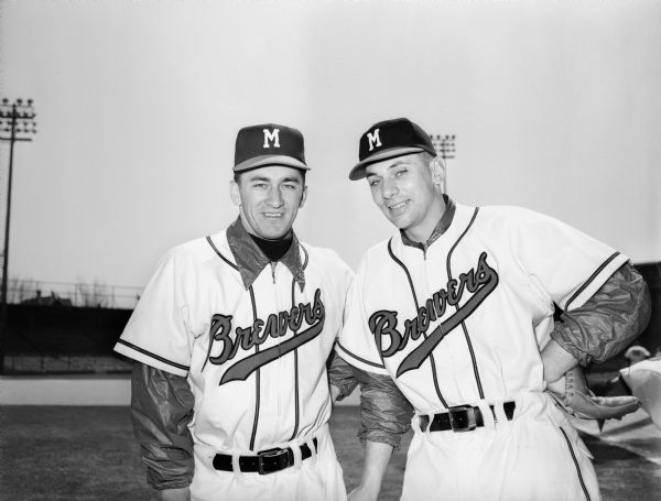 Future Milwaukee Braves shortstop Johny Logan (left) and second baseman Jack Dittmer, photographed as members of the Milwaukee Brewers minor league team in 1952. The Brewers were a farm club for the Boston Braves. Logan played briefly for the Braves in 1951, but returned to Milwaukee for the start of the 1952 season. Both he and Dittmer joined the big-league Braves later in 1952. Both players moved to Milwaukee along with the Braves in 1953. Dittmer played for the Milwaukee Braves from 1953 until he was traded to Detroit after the 1956 season. Logan played for the Milwaukee Braves from 1953-1961.