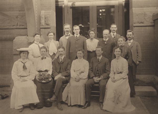 Group portrait of the Menomonie High School Faculty from 1903. Part of a 1905 yearbook created by classmate Albert Hansen, based on a class prophecy theme.