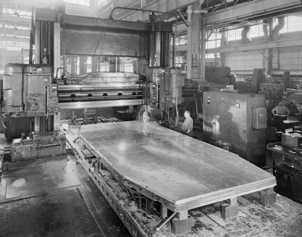 View of the manufacturing process of vacuum chucks. Used for skin milling, this particular order, according to an original Falk caption, "covers four duplicate chucks manufactured from design to final test by Falk." Later purchased and used by Reynolds-Metals of McCook Illinois.