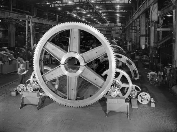 Single large helical hub gear that was a component of an oxygen furnace drive. This gear was purchased by Morgan Engineering Company and used by Pittsburgh Steel. This view was taken in Falk Shop number 4.