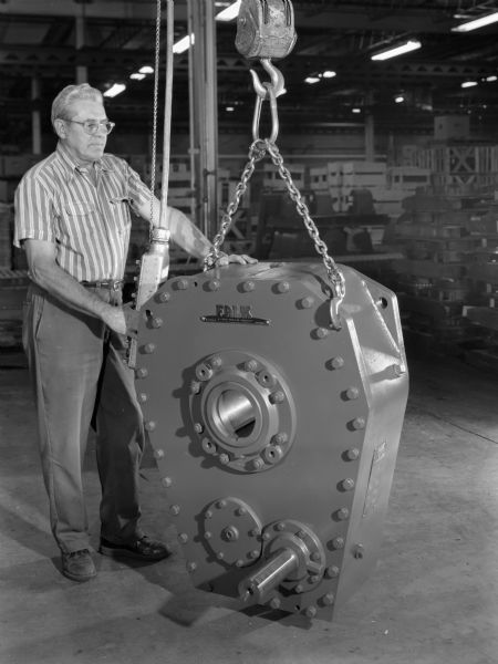 View of a 600 J shaft mount. Man in photograph is George Tinger.