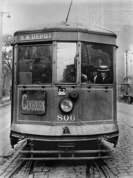 Front end of a streetcar on a Milwaukee street. Original Falk caption reads, "Photos borrowed from Milwaukee County Transport for use in brochure 850801. Originals returned to County. Milwaukee streetcars."