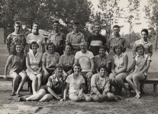 Group portrait of participants of the Unitarian Work Camp at the Highlander Folk School. The central male figure is identified as Fred Lasse.