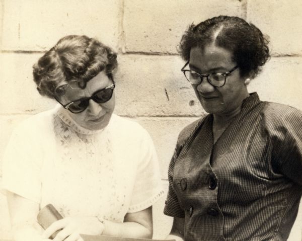 Alice Cobb (left), a Highlander Folk School staff member, and an unidentified workshop participant during a Civil Rights workshop at the school.