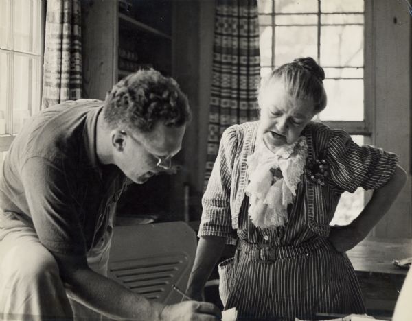 A late 1930s early 1940s writers workshop at Highlander run by Leon  Wilson.  Charlie Ferguson, Editor, Reader's Digest, working with Mrs. Joe Kelly Stockton from Allardt, Tennessee. Mrs. Stockton later  ran for Governor of Tennessee on the Socialist Ticket.