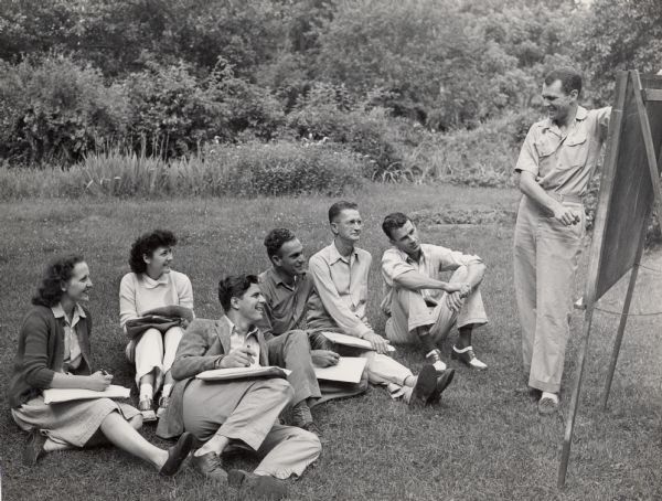 CIO School group discussion in front yard of Highlander.  Mr. Brock, a member of the National Educational Staff, leads a discussion.