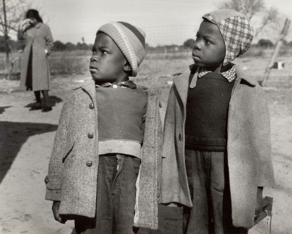 Two young African American boys in coats and hats on Johns Island.