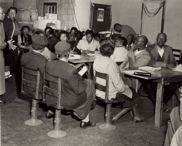 Mrs. Brewer teaching a citizenship class at Edisto Island. Septima Clark, far left.