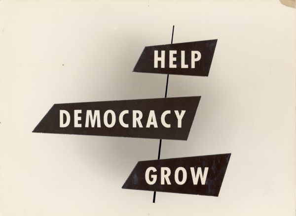 Collaged image of the words: "Help Democracy Grow." Part of a series of Highlander photographic collages from the film center.
