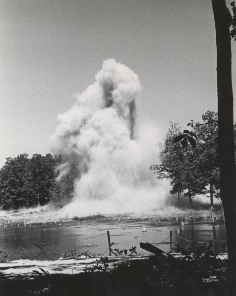 Detonated dynamite effecting the spillway to Highlander Lake.