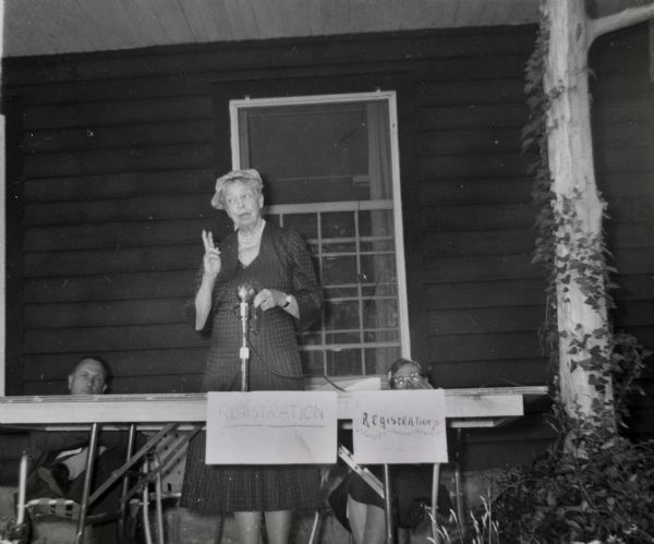 Eleanor Roosevelt, standing, with Myles Horton, and May Justus at the 25th anniversary of Highlander Folk School.