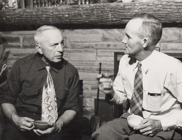 A rural minister and a farmer from Kodak, Tennessee, taking time out for coffee after one of the residence classes at the Gatlingburg conference on Organization of a Rural Community.  Left, Roy Houts, methodist minister; right, Kurt Smith, farmer.