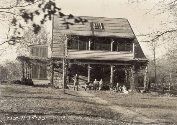 Picture from the beginning of Highlander Folk School, in front of main office before addition was added.  From left to right: Delmus Horton (brother of Myles Horton), Malcom Chisholm (killed in Spanish Civil War), John Layton (killed in International Brigade, Spanish Civil War), Dorothy Thompson, Rupert Hampton, Pearl Horton (Myles Horton's sister).  In front of main building.