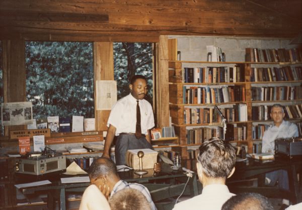 Martin Luther King, Jr. speaking at Highlander's 25th Anniversary, August-September, inside Highlander Library.
