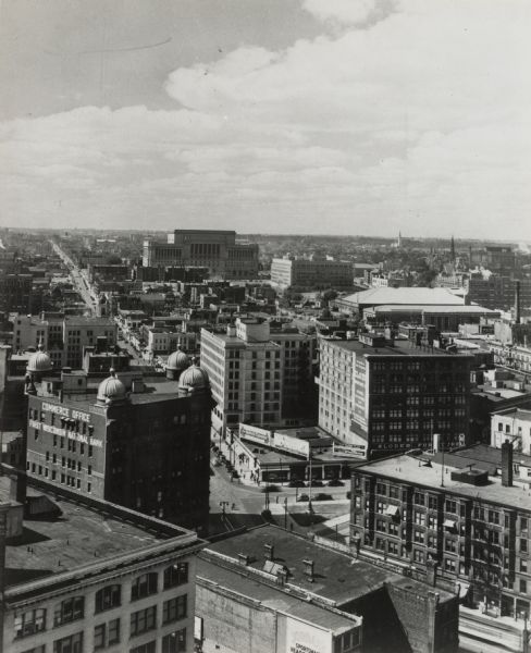 Elevated view down Wells Street from the first Wisconsin National Bank Building. Commerce office on lower left.