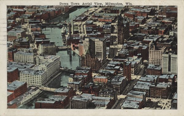 Downtown aerial view with the Milwaukee River and City Hall. Caption reads: "Downtown Aerial View, Milwaukee, Wis."