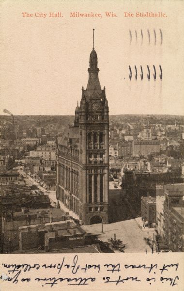 Elevated view of City Hall.  Above the image is the title. location, and "Die Stadthalle." On the bottom of the image is written "This is not so attractive as yours, but is was the best of a poor collection."