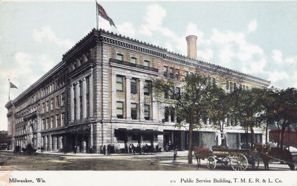 View down street towards the building which has a crowd of people on the sidewalk. On the right is a small line of trees and a man in the Express No. 45 cart. Caption reads: "Milwaukee, Wis." and "Public Service Building, T.M.E.R. & L. Co."