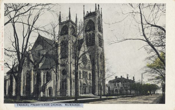 View up road towards the Gothic style church on the left. Caption reads: "Emanuel Presbyterian Church, Milwaukee."