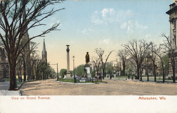 Now called Wisconsin Avenue. Split avenue (strip of land down the center). There are several statues on plinths and/or columns in the median. Caption reads: "Milwaukee, Wis."Captions read: "View on Grand Avenue." and "Milwaukee, Wis."