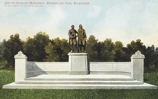 Monument in Washington Park with two male figures side by side on a plinth in the center, with curved walls ending in two small columns surrounding them, with grass in the foreground and a line of trees behind. Caption reads: "Goethe-Schiller Monument, Washington Park, Milwaukee. To be unveiled in the spring of 1908."