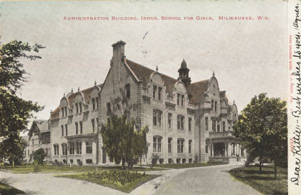 Administration building for the school. The building has over three stories, and a covered main entrance. Caption reads: "Administration Building, Industrial School for Girls, Milwaukee, Wis."