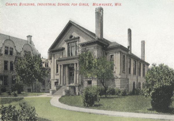 View across lawn toward the Chapel Building. Small footpaths curve from the left and right to the entrance. Caption reads: "Chapel Building, Industrial School for Girls, Milwaukee, Wis."