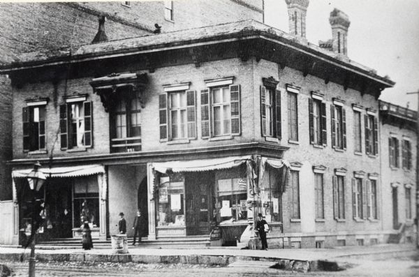 Northwest corner of Grand Avenue and 4th Street. Built in 1854 at a cost of $18,000. The storefronts were added in 1868; the building razed in 1886.