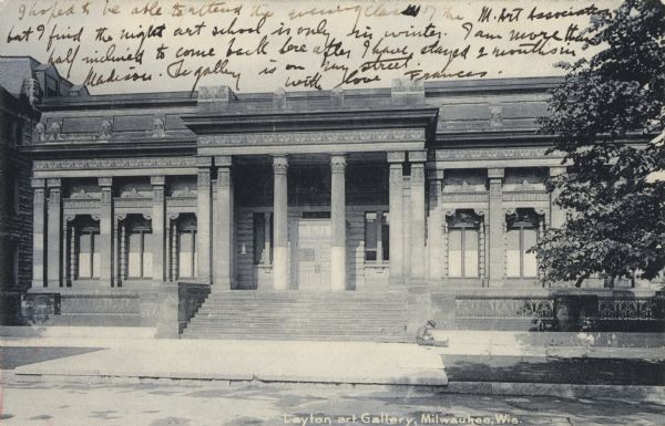 Exterior of classical-style building. Facade has fluted columns, decorated capitals, ornate railings, and a wide stairway leading to the entrance. A man is sitting at the bottom of the steps. Caption reads: "Layton Art Gallery, Milwaukee, Wis."