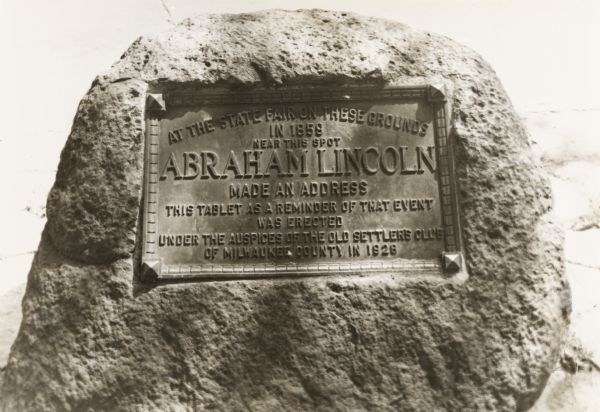 Monument located on 13th Street.  Large rough stone with a metal plaque set into it.  The plaque marks the spot near where Lincoln made an address in 1859.