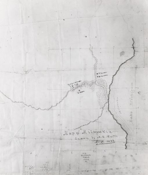 Drawing on a faint grid with Lake Michigan on the right, and the rivers on the left.  Labeled is an Indian Village, J. Veiu, S. Juneau, and P. Juneau.  Along the bottom are numbers and some math work.